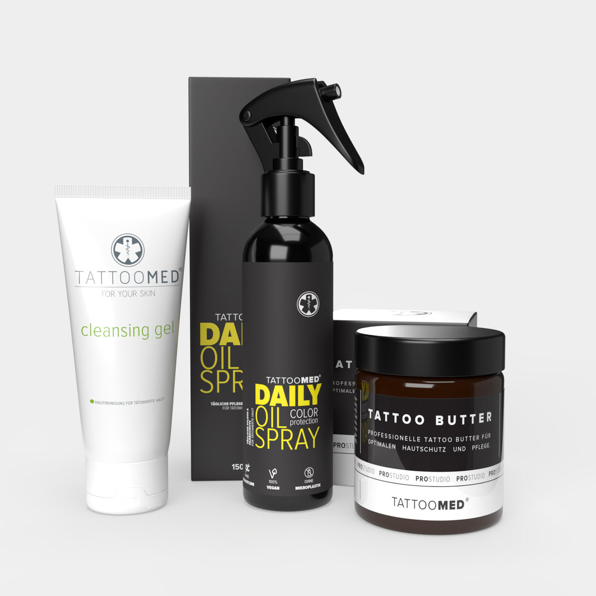 TattooMed Glow&Care Set. Tattoo-Pflege-Set beinhaltet TattooMed Cleansing Gel, TattooMed Daily Oil Spray und TattooMed Tattoo Butter.