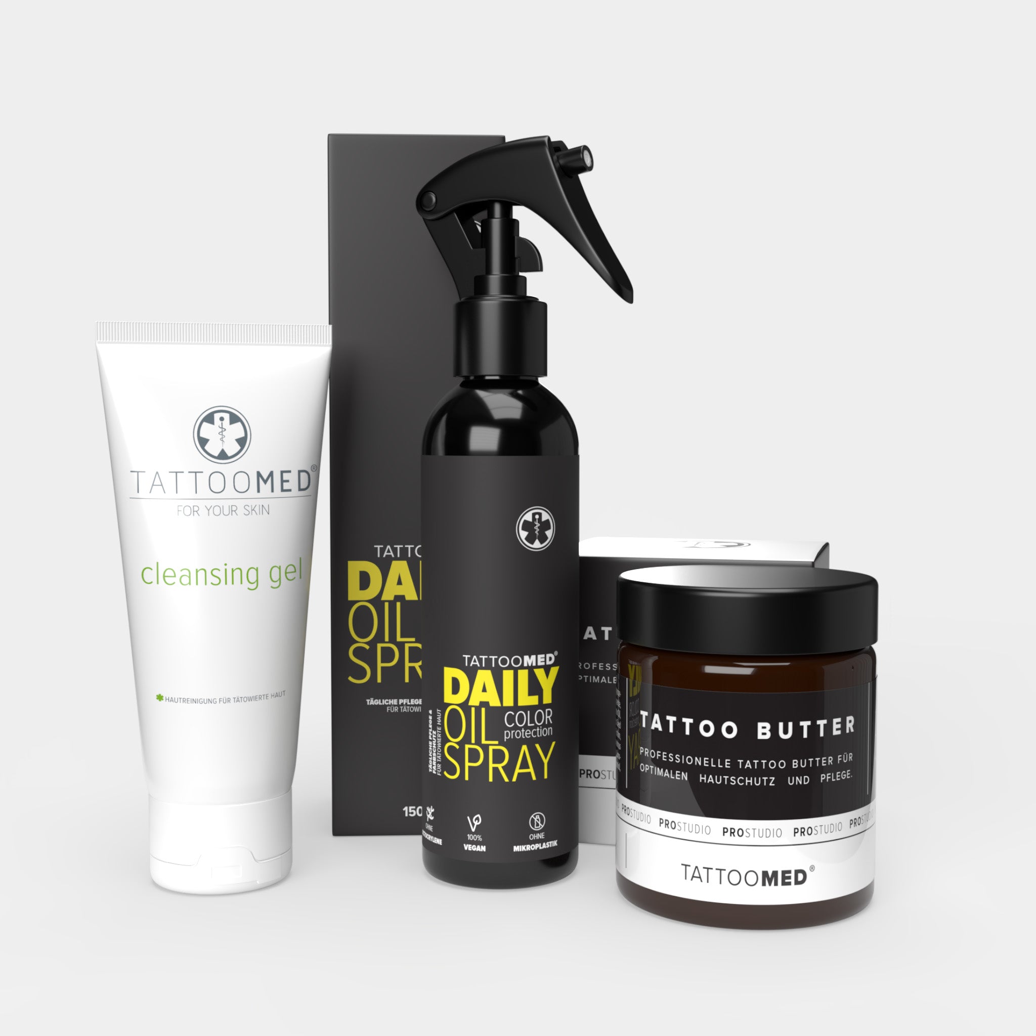TattooMed Glow&Care Set. Tattoo-Pflege-Set beinhaltet TattooMed Cleansing Gel, TattooMed Daily Oil Spray und TattooMed Tattoo Butter.